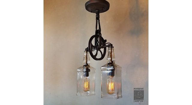 The Carriage House Victorian Style Pulley Wheel Pendant Light With Recycled Glass Whiskey Bottle Lampshades