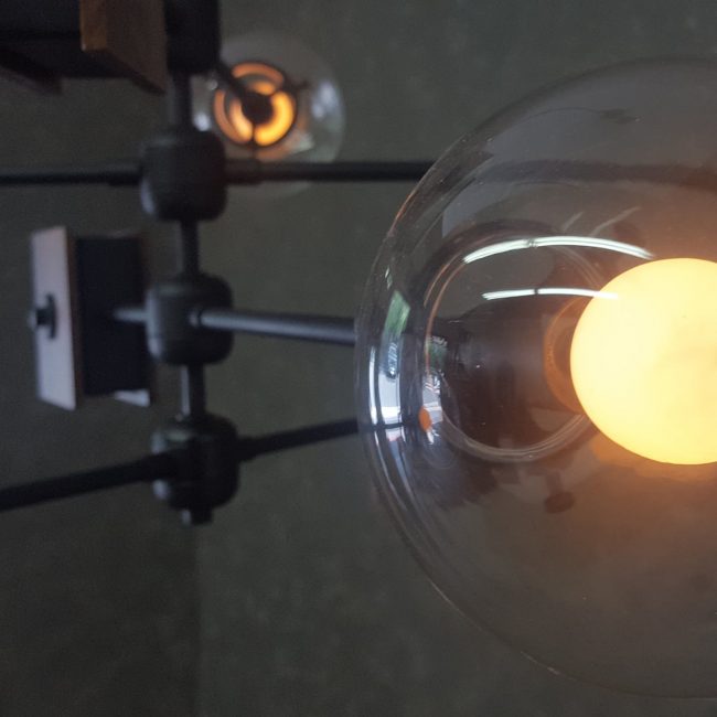 Close up of Glass Orb on Continental Mid Century Modern Atomic Chandelier